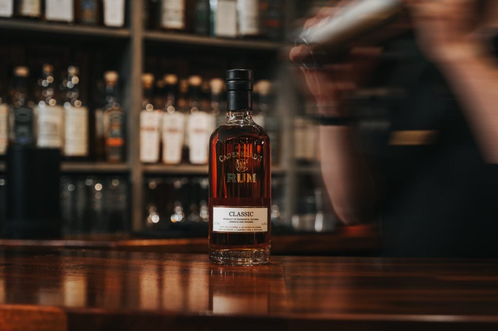 A cocktail being made with Cadenhead's whisky at the bar