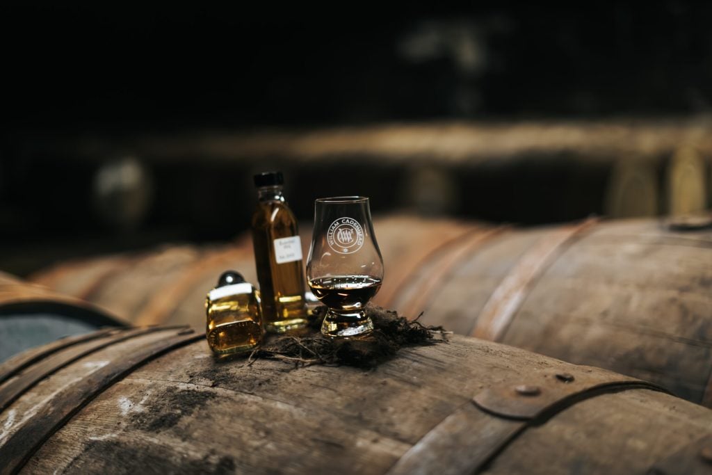 A dram resting on a cask in the warehouse