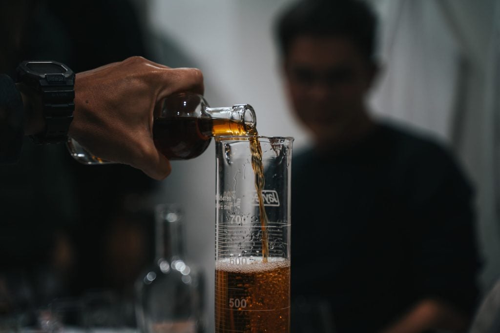 Pouring a drink at the Tasting Room bar